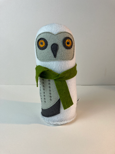 Woodland character snowy owl made of felt with a holly green scarf