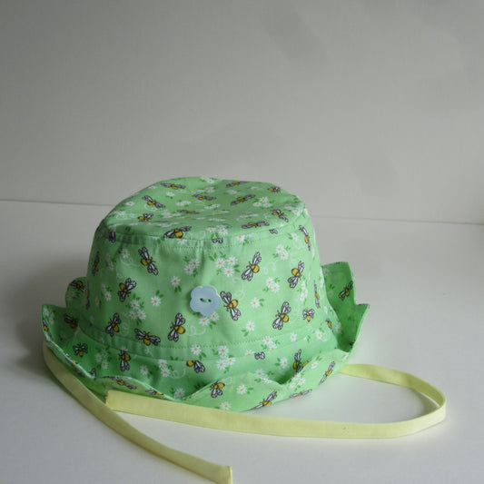 Kid's Sun Hat Made of 100% Cotton Fabric in a Bumble Bee and Daisy Print and Plain Cotton Lining and Ties