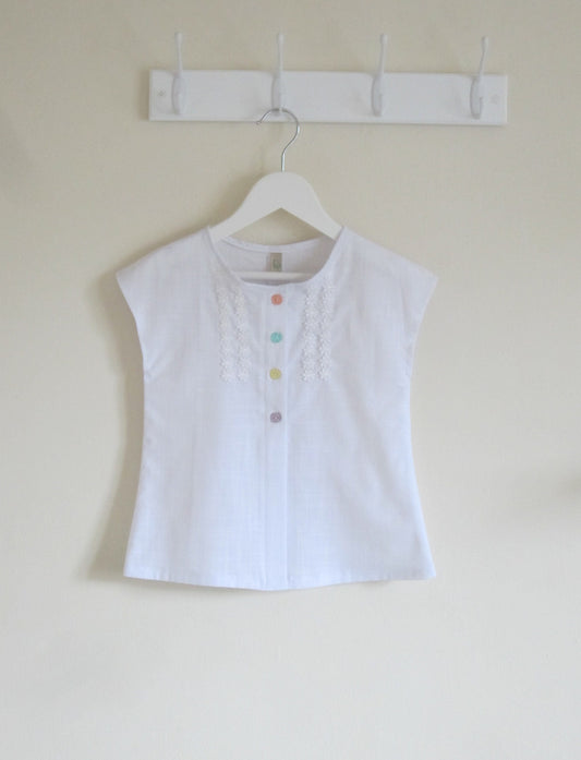 Girls Blouse in Pure White Cotton with Daisy Chain Front Detail and Feature Buttons