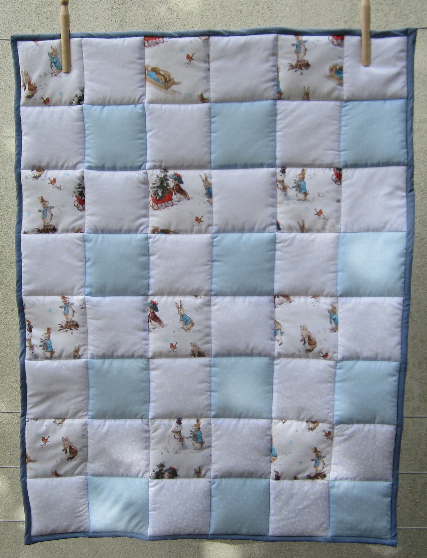 Newborn Baby Christmas Quilt Featuring Peter Rabbit, Benjamin Bunny and Robin Playing in the Snow